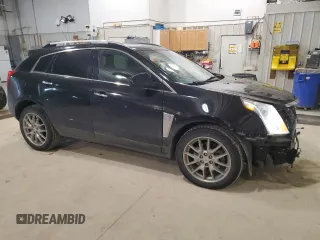 2015 Cadillac SRX Premium Collection with VIN 3GYFNGE33FS543328, listed as a Copart auction lot 41856565 with 132,647 mi miles and Salvage Title. Bid and sale history available at carsss.com. Image 4.