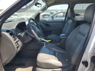 2007 Ford Escape Hybrid with VIN 1FMCU49H87KB61613, listed as a Copart auction lot 58083235 with 129,049 mi miles and Salvage title. Bid and sale history available at DreamBid. Image 7.