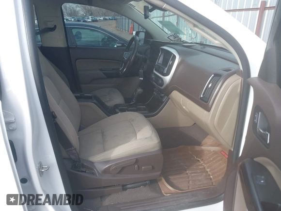 2019 GMC Canyon 4WD SLE z VIN 1GTG6CEN5K1297945, wystawiony jako IAAI lot #41308105 z przebiegiem 93 226 mil mil oraz . Historia ofert i sprzedaży dostępna na DreamBid. Obrazek 5.