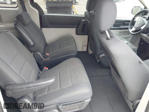 2009 Dodge Grand Caravan SE with VIN 2D8HN44E19R533142, listed as a IAAI auction lot 42277333 with 201,081 mi miles and . Bid and sale history available at DreamBid. Image 8.