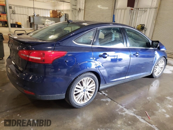 2016 Ford Focus Titanium z VIN 1FADP3J27GL310367, wystawiony jako Copart lot #55048005 z przebiegiem 86 676 mil mil oraz Szkoda całkowita • Salvage title. Historia ofert i sprzedaży dostępna na DreamBid. Obrazek 3.