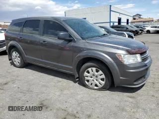 2014 Dodge Journey American Value Pkg with VIN 3C4PDCAB8ET256983, listed as a Copart auction lot 54976545 with 184,764 mi miles and Clean Title. Bid and sale history available at carsss.com. Image 4.