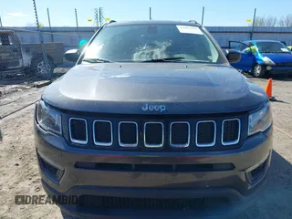 2019 Jeep Compass Sport with VIN 3C4NJCAB0KT613116, listed as a IAAI auction lot 39002435 with 59,805 mi miles and . Bid and sale history available at DreamBid. Image 12.
