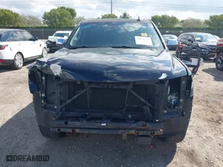 2015 Chevrolet Tahoe LTZ with VIN 1GNSCCKC7FR746028, listed as a IAAI auction lot 41674775 with 198,067 mi miles. Bid and sale history available at carsss.com. Image 13.