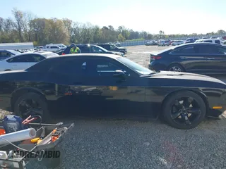 2014 Dodge Challenger R/T Plus z VIN 2C3CDYBT2EH274265, wystawiony jako IAAI lot #41845052 z przebiegiem 120 290 mil mil oraz . Historia ofert i sprzedaży dostępna na DreamBid. Obrazek 13.