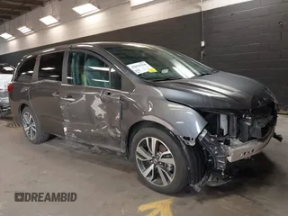 2024 Honda Odyssey Touring z VIN 5FNRL6H84RB035974, wystawiony jako IAAI lot #42031526 z przebiegiem 7 285 mil mil oraz . Historia ofert i sprzedaży dostępna na DreamBid. Obrazek 1.