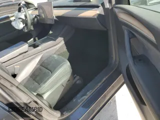 2023 Tesla Model Y Long Range z VIN 7SAYGDEE7PF822934, wystawiony jako Copart lot #49285285 z przebiegiem Nie podano mil oraz Szkoda całkowita • Salvage title. Historia ofert i sprzedaży dostępna na DreamBid. Obrazek 8.
