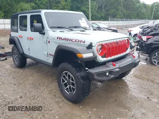 2024 Jeep Wrangler Rubicon z VIN 1C4PJXFG4RW160501, wystawiony jako IAAI lot #42366618 z przebiegiem 16 515 mil mil oraz . Historia ofert i sprzedaży dostępna na DreamBid. Obrazek 1.
