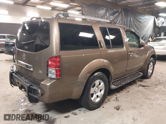 2005 Nissan Pathfinder SE z VIN 5N1AR18W65C703936, wystawiony jako IAAI lot #41271670 z przebiegiem 129 744 mil mil oraz . Historia ofert i sprzedaży dostępna na DreamBid. Obrazek 4.