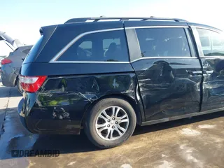 2013 Honda Odyssey EX-L with VIN 5FNRL5H6XDB090768, listed as a IAAI auction lot 42008759 with 116,052 mi miles and . Bid and sale history available at carsss.com. Image 18.