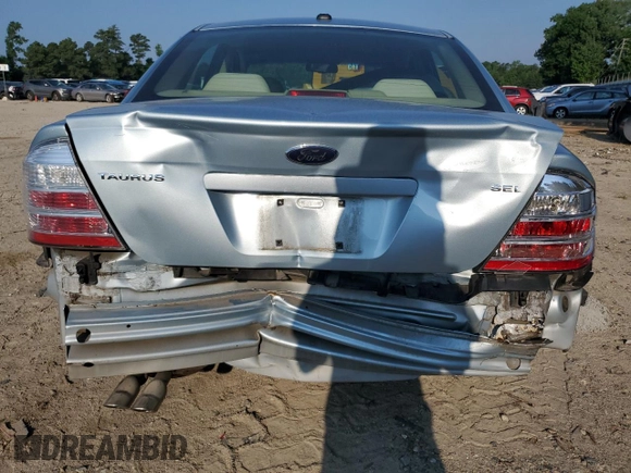 2008 Ford Taurus SEL with VIN 1FAHP24W68G187312, listed as a Copart auction lot 62879765 with 154,706 mi miles and Salvage title. Bid and sale history available at DreamBid. Image 6.