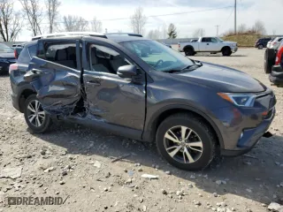 2016 Toyota RAV4 XLE with VIN 2T3RFREV6GW410094, listed as a Copart auction lot 50030555 with 111,610 mi miles and Salvage Title. Bid and sale history available at carsss.com. Image 4.