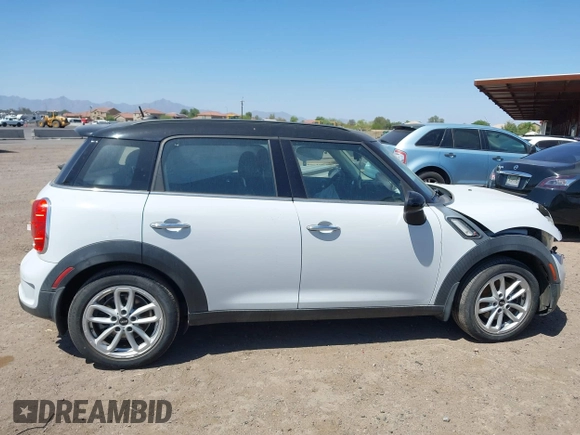 2016 MINI Countryman S with VIN WMWZC3C54GWT08011, listed as a IAAI auction lot 42274242 with 99,183 mi miles and . Bid and sale history available at DreamBid. Image 13.