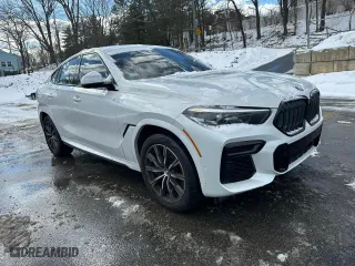 2022 BMW X6 M50i with VIN 5UXCY8C06N9K81254, listed as a Copart auction lot 44739935 with 70,059 mi miles and Clean Title. Bid and sale history available at carsss.com. Image 4.