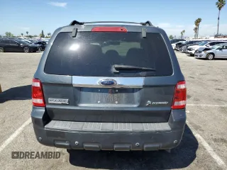 2009 Ford Escape Hybrid with VIN 1FMCU493X9KB03901, listed as a Copart auction lot 52353675 with 145,444 mi miles and Salvage title. Bid and sale history available at DreamBid. Image 6.
