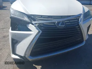 2018 Lexus RX 350 z VIN 2T2BZMCAXJC144930, wystawiony jako IAAI lot #41857778 z przebiegiem 108 191 mil mil oraz . Historia ofert i sprzedaży dostępna na DreamBid. Obrazek 18.