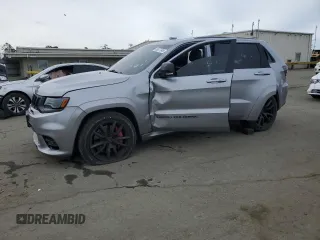 2017 Jeep Grand Cherokee SRT with VIN 1C4RJFDJ8HC663059, listed as a Copart auction lot 45677045 with 88,914 mi miles and Salvage Title. Bid and sale history available at carsss.com. Image 1.