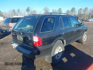 2003 Isuzu Rodeo with VIN 4S2CK58W034303195, listed as a IAAI auction lot 41219379 with 215,821 mi miles and . Bid and sale history available at DreamBid. Image 4.