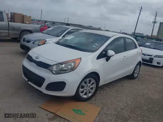 2012 Kia Rio LX with VIN KNADM5A37C6094193, listed as a IAAI auction lot 41940411 with 166,626 mi miles. Bid and sale history available at carsss.com. Image 2.