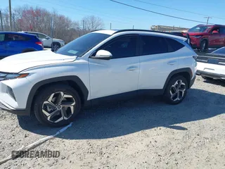 2023 Hyundai Tucson SEL with VIN 5NMJFCAE3PH261633, listed as a IAAI auction lot 41795265 with 39,374 mi miles and . Bid and sale history available at DreamBid. Image 2.