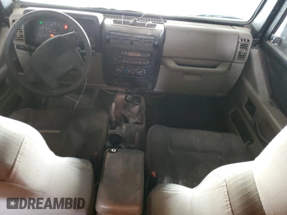 2003 Jeep Wrangler Sahara with VIN 1J4FA59S03P336844, listed as a Copart auction lot 49290345 with 167,726 mi miles and Salvage title. Bid and sale history available at DreamBid. Image 8.