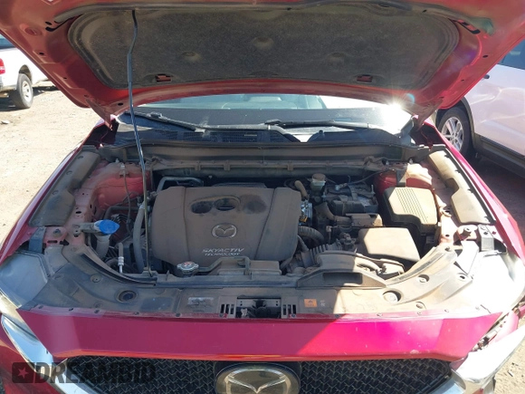 2019 Mazda CX-5 Grand Touring with VIN JM3KFADM5K1556917, listed as a IAAI auction lot 41706323 with 77,804 mi miles. Bid and sale history available at carsss.com. Image 10.