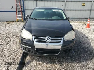 2009 Volkswagen Jetta S z VIN 3VWJM71K39M165677, wystawiony jako Copart lot #56901665 z przebiegiem 202 632 mil mil oraz Czysty tytuł • Clean title. Historia ofert i sprzedaży dostępna na DreamBid. Obrazek 5.