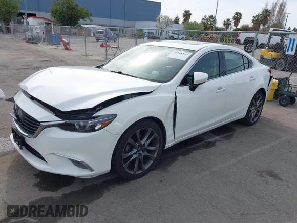 2016 Mazda Mazda6 i Grand Touring with VIN JM1GJ1W51G1444867, listed as a IAAI auction lot 41988597 with 86,844 mi miles. Bid and sale history available at carsss.com. Image 17.