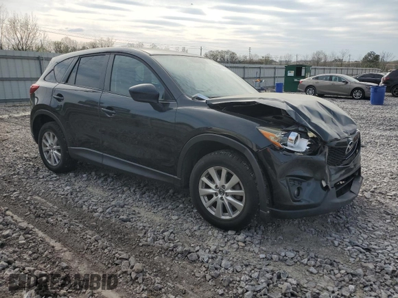 2014 Mazda CX-5 Touring with VIN JM3KE2CY9E0375990, listed as a Copart auction lot 50875165 with 166,574 mi miles and Salvage Title. Bid and sale history available at carsss.com. Image 4.