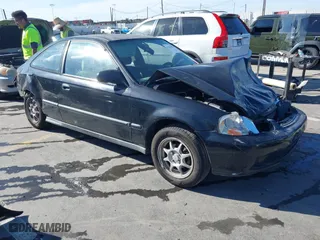 1999 Honda Civic HX with VIN 1HGEJ7225XL057136, listed as a IAAI auction lot 41824506 with 181,282 mi miles. Bid and sale history available at carsss.com. Image 1.