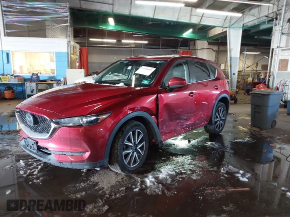 2018 Mazda CX-5 Touring with VIN JM3KFBCM7J0430425, listed as a IAAI auction lot 41524553 with 102,715 mi miles. Bid and sale history available at carsss.com. Image 2.