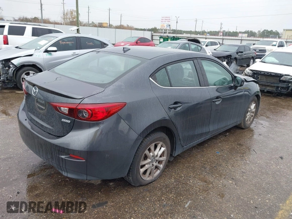 2015 Mazda 3 i Grand Touring with VIN 3MZBM1W78FM236096, listed as a IAAI auction lot 41320225 with 123,301 mi miles and . Bid and sale history available at DreamBid. Image 4.