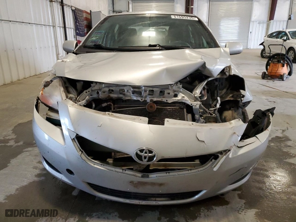 2010 Toyota Yaris with VIN JTDBT4K34A4071145, listed as a Copart auction lot 51695235 with 161,012 mi miles and Salvage Title. Bid and sale history available at carsss.com. Image 5.
