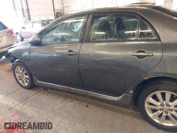 2010 Toyota Corolla with VIN 2T1BU4EE8AC510757, listed as a IAAI auction lot 41589152 with 164,857 mi miles. Bid and sale history available at carsss.com. Image 15.