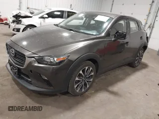 2019 Mazda CX-3 Touring z VIN JM1DKFC79K0442432, wystawiony jako IAAI lot #42153025 z przebiegiem 69 187 mil mil oraz . Historia ofert i sprzedaży dostępna na DreamBid. Obrazek 2.
