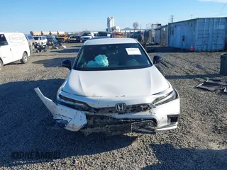 2024 Honda Civic Sport z VIN 2HGFE2F58RH550597, wystawiony jako IAAI lot #41688202 z przebiegiem 7 198 mil mil oraz . Historia ofert i sprzedaży dostępna na DreamBid. Obrazek 12.