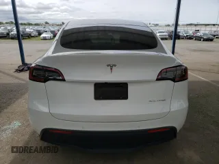 2022 Tesla Model Y Long Range with VIN 7SAYGAEE9NF384400, listed as a Copart auction lot 51961545 with 31,758 mi miles and Salvage Title. Bid and sale history available at DreamBid. Image 6.