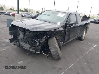 2023 Nissan Frontier S with VIN 1N6ED1CM5PN611795, listed as a IAAI auction lot 42033697 with 6,744 mi miles and . Bid and sale history available at DreamBid. Image 2.