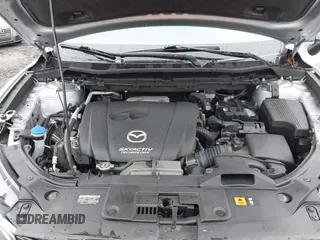 2016 Mazda CX-5 Grand Touring with VIN JM3KE4DY4G0712465, listed as a IAAI auction lot 41859217 with 61,806 mi miles and . Bid and sale history available at carsss.com. Image 10.