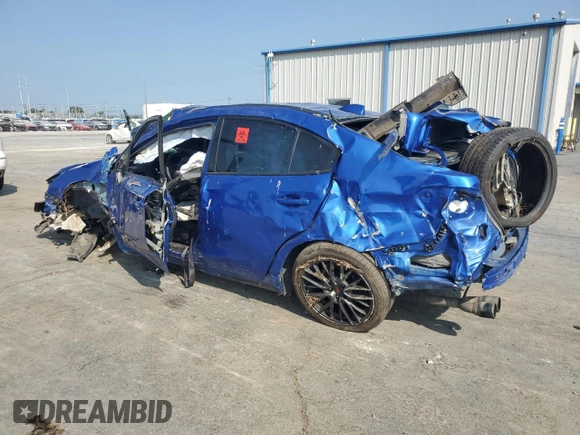 2015 Subaru WRX STI with VIN JF1VA2L66F9804795, listed as a Copart auction lot 71095344 with 141,122 mi miles and Salvage title. Bid and sale history available at DreamBid. Image 2.
