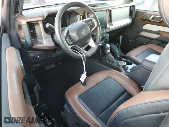 2021 Ford Bronco z VIN 1FMDE5CP4MLA65927, wystawiony jako Copart lot #74809974 z przebiegiem 41 296 mil mil oraz Nie do naprawy • Non repairable. Historia ofert i sprzedaży dostępna na DreamBid. Obrazek 8.