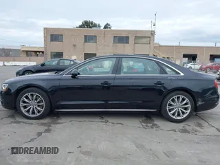 2012 Audi A8 L with VIN WAURVAFD7CN005452, listed as a IAAI auction lot 41529084 with 80,738 mi miles. Bid and sale history available at carsss.com. Image 14.