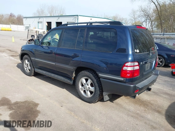 2004 Toyota Land Cruiser with VIN JTEHT05J942054673, listed as a IAAI auction lot 42112791 with 206,784 mi miles. Bid and sale history available at carsss.com. Image 3.