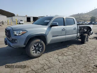 2020 Toyota Tacoma SR5 with VIN 3TMDZ5BN9LM096936, listed as a Copart auction lot 54876245 with 81,025 mi miles and Salvage title. Bid and sale history available at DreamBid. Image 1.