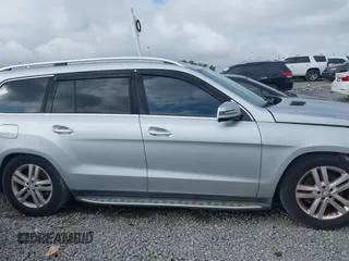 2014 Mercedes-Benz GL 450 z VIN 4JGDF7CE4EA347876, wystawiony jako IAAI lot #42386949 z przebiegiem 133 400 mil mil oraz . Historia ofert i sprzedaży dostępna na DreamBid. Obrazek 13.