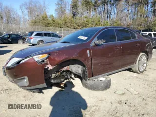 2012 Lincoln MKS with VIN 1LNHL9ER2CG802577, listed as a Copart auction lot 85455164 with 121,169 mi miles and Salvage Title. Bid and sale history available at DreamBid. Image 1.