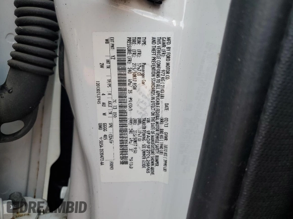 2013 Ford Focus SE with VIN 1FADP3F27DL258565, listed as a Copart auction lot 60662385 with 174,213 mi miles and Salvage title. Bid and sale history available at DreamBid. Image 12.