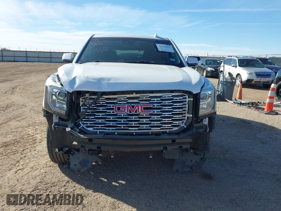 2020 GMC Yukon Denali with VIN 1GKS2CKJ3LR260455, listed as a IAAI auction lot 41690495 with 92,498 mi miles. Bid and sale history available at carsss.com. Image 12.