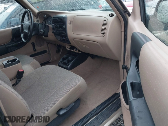 2002 Ford Ranger XL z VIN 1FTZR15E92PB61299, wystawiony jako IAAI lot #41471659 z przebiegiem 156 466 mil mil oraz . Historia ofert i sprzedaży dostępna na DreamBid. Obrazek 5.