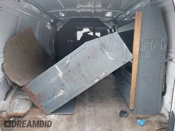 2011 Ford Econoline Cargo Commercial with VIN 1FTNE1EWXBDA35585, listed as a IAAI auction lot 41349320 with 122,311 mi miles and . Bid and sale history available at carsss.com. Image 8.
